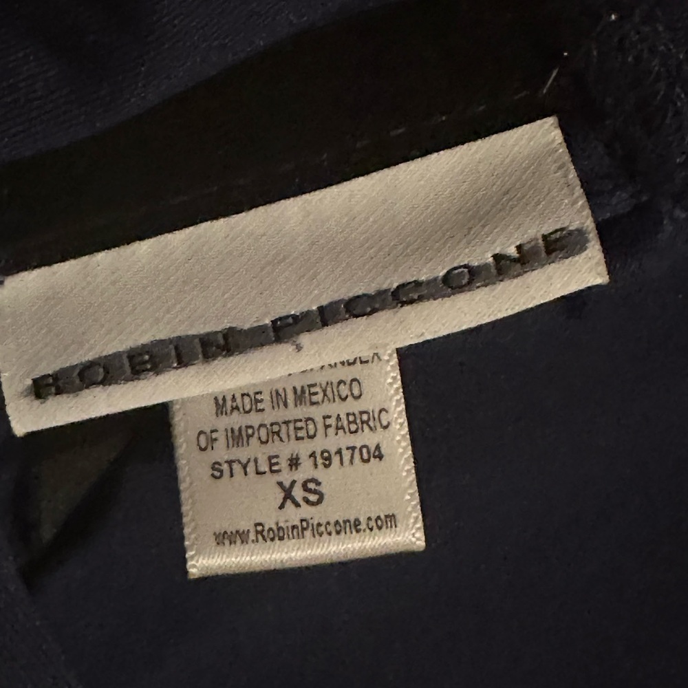 NWOT Robin Piccone Ava High Neck Cutout Tie
Bikini Top - Picture 6 of 8